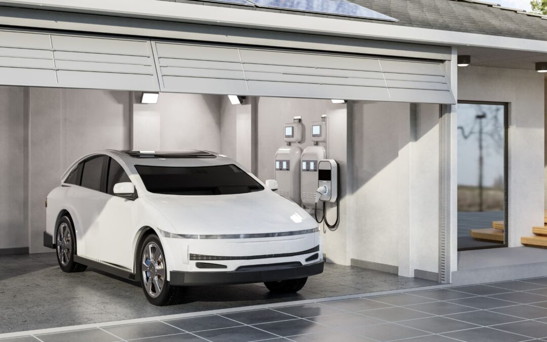 picture of eleectric vihecle pluged in to ev charging statiion in the garrage installed by DNZ Electrical Services