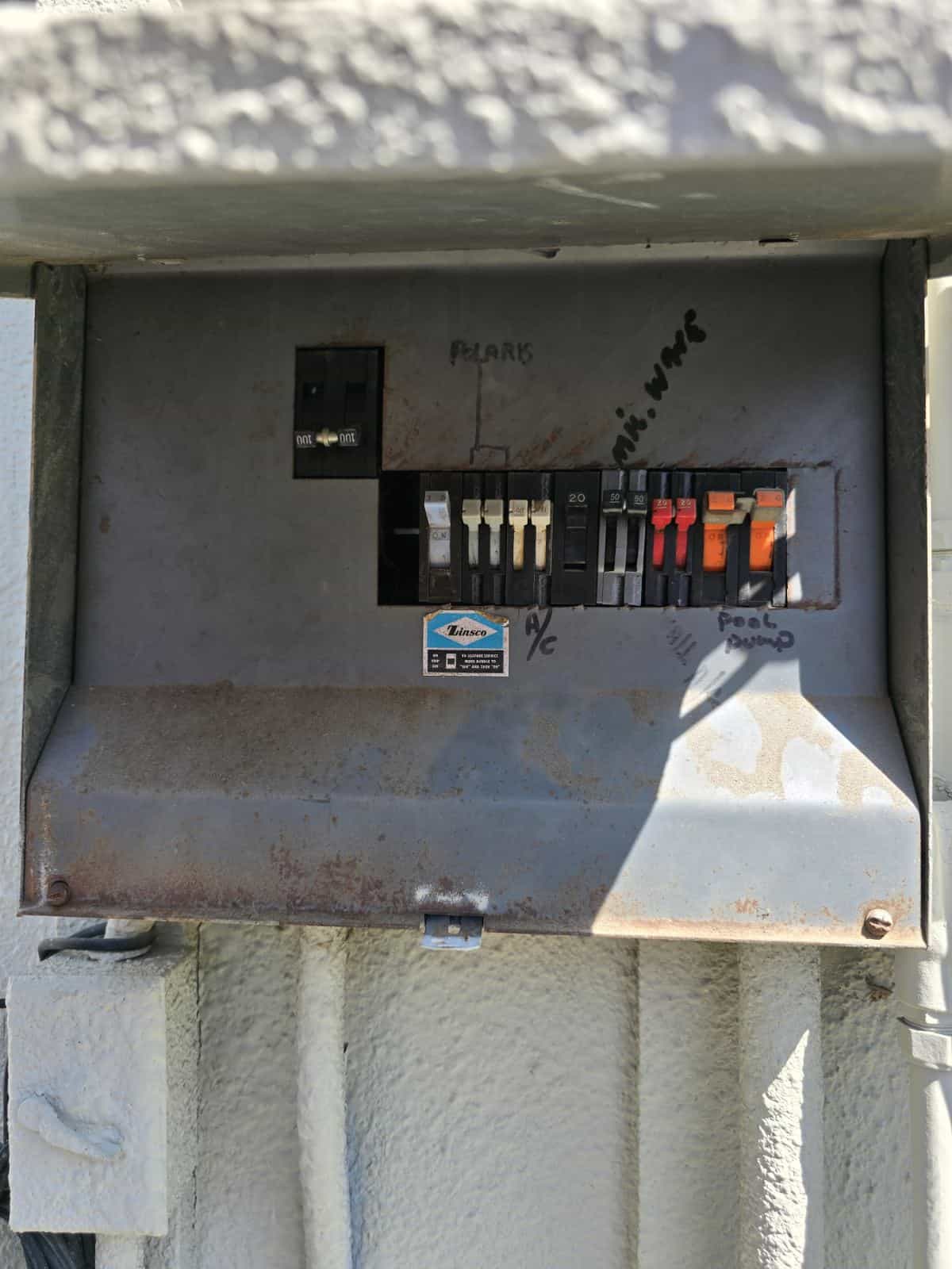 Electrical Panel Upgrade Modern electrical panel with circuit breakers for home upgrade.